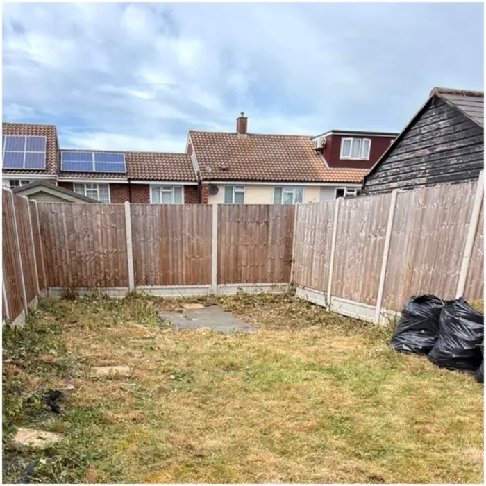 Overgrown garden brought back under control