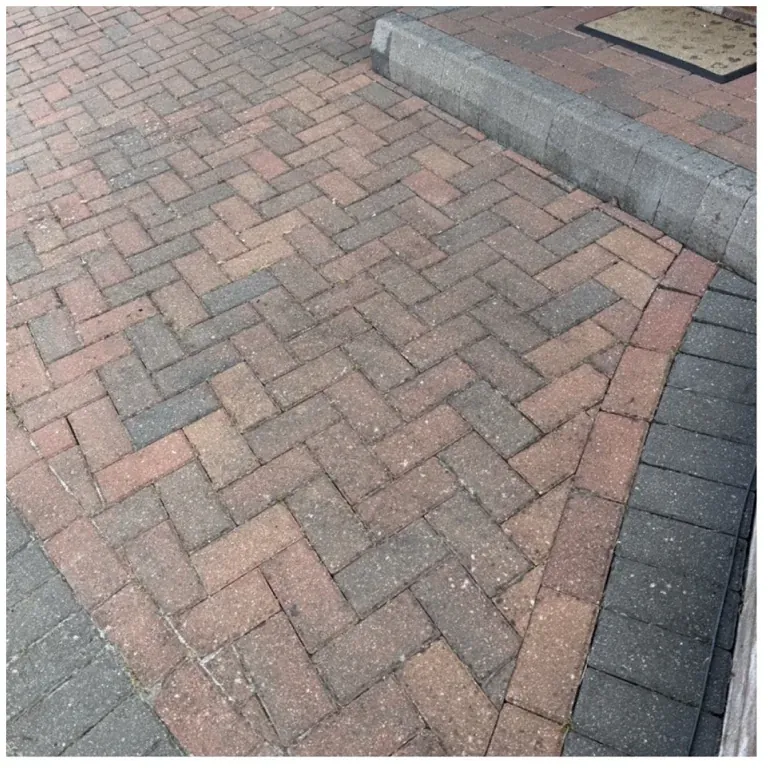 Block-paved path after weeds were cleared from the joints